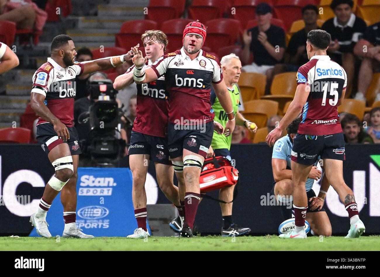 Harry Wilson Qld Rugby Harry Wilson of the Reds (centre) after scoring a try during the Super ...