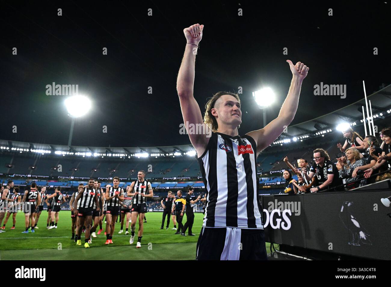 Melbourne, Australia. 15th Mar, 2025. Darcy Moore of Collingwood leads