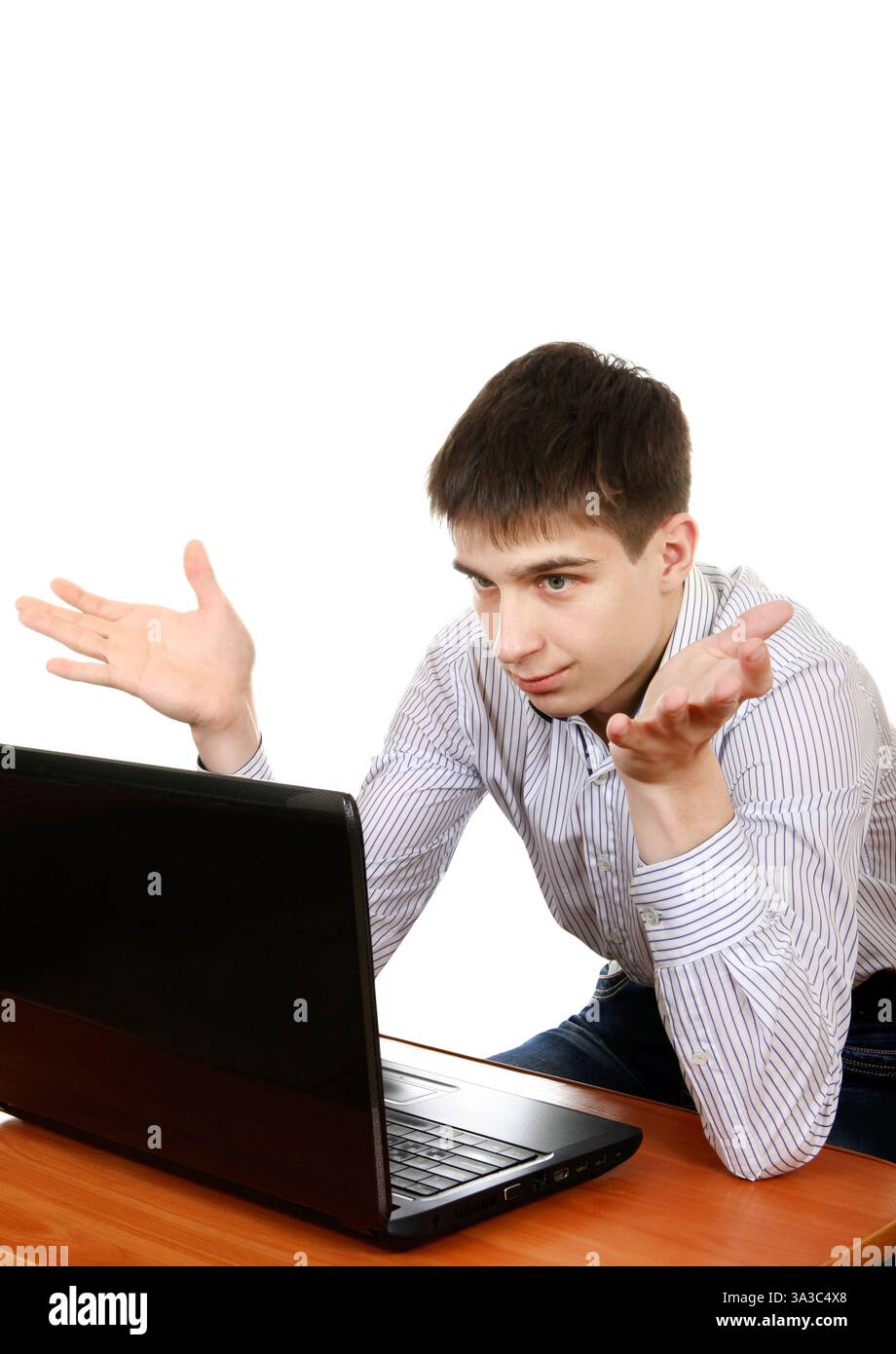 Troubled Teenager at the Desk with Laptop Isolated on the White ...