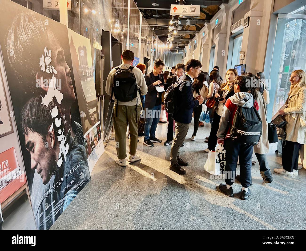 Taipei, Taiwan, Crowd Young People, Visiting, inside Taiwanese Cinema, The Spot Cinema,'Huashan 1914 Creative Park » Movie Posters - Smartphone Captured Stock Image