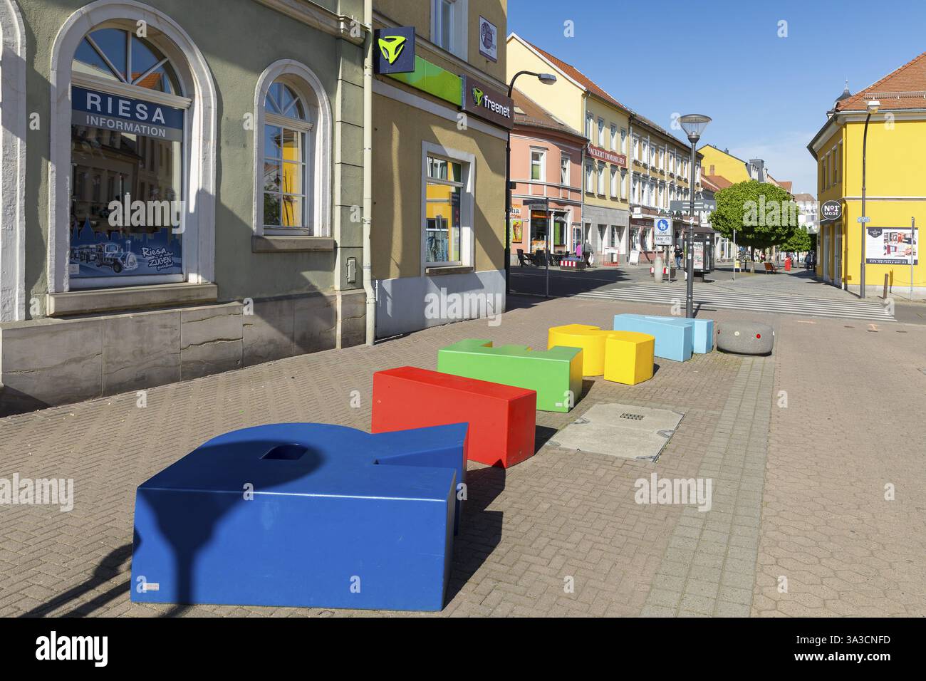 Colourful seating as letters in the pedestrian zone Hauptstrasse in the ...