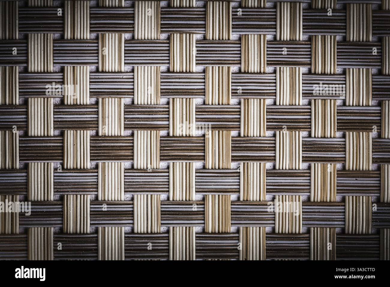 Texture old dusted wicker mat close up Stock Photo