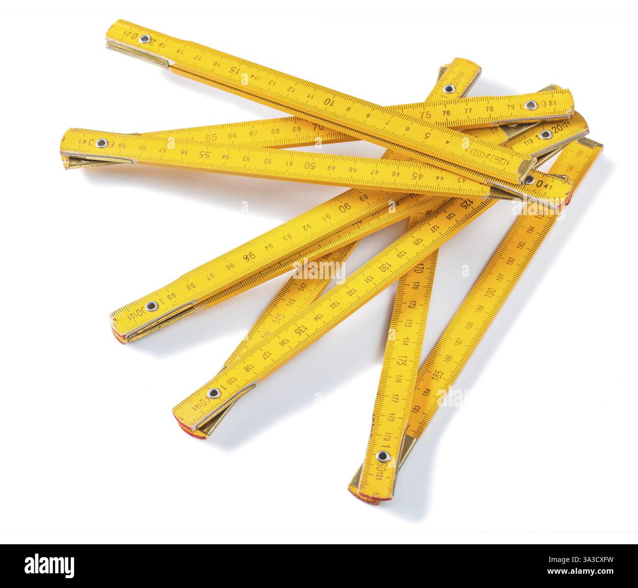 Yellow wooden meter isolated on white Stock Photo - Alamy