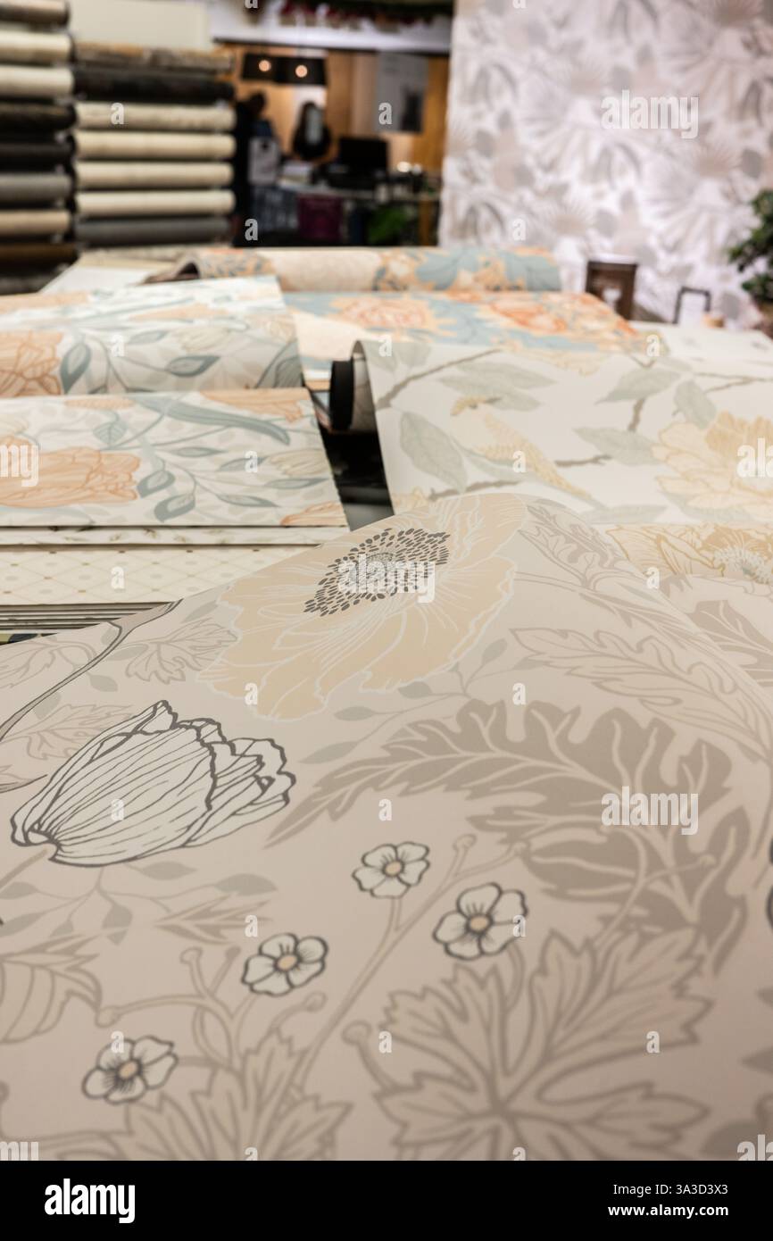 Rolls of wallpaper on a table Stock Photo