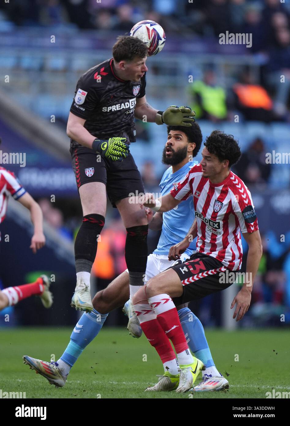 Sunderland goalkeeper Anthony Patterson clears the ball under pressure ...