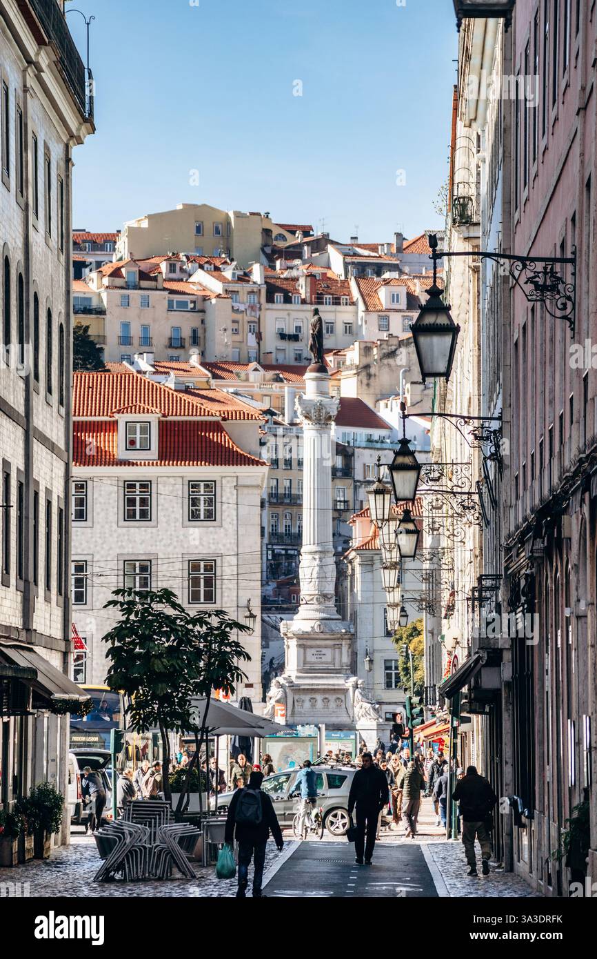 Historic Baixa street with a bustling pedestrian zone
