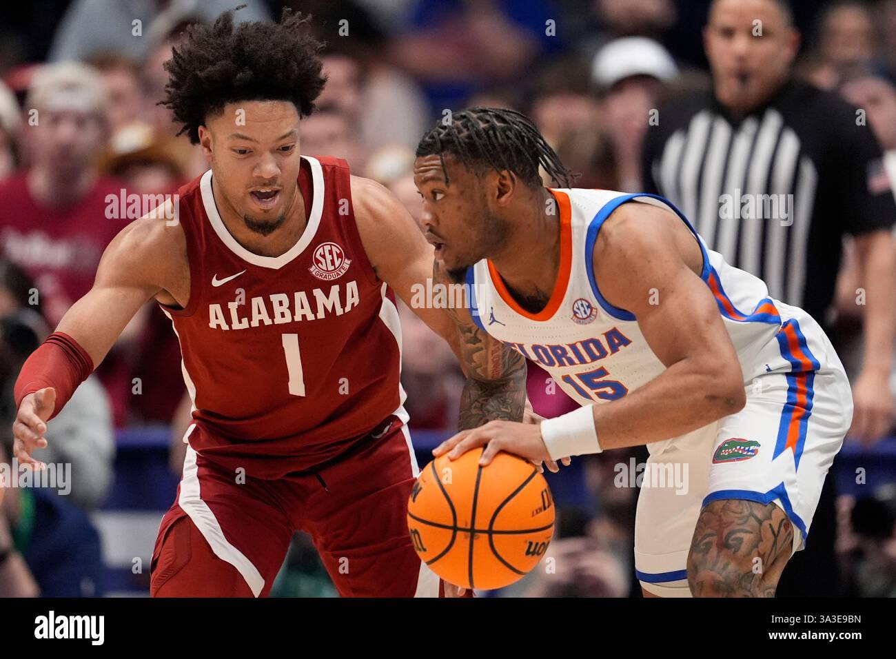 Florida guard Alijah Martin (15) moves against Alabama guard Mark Sears ...