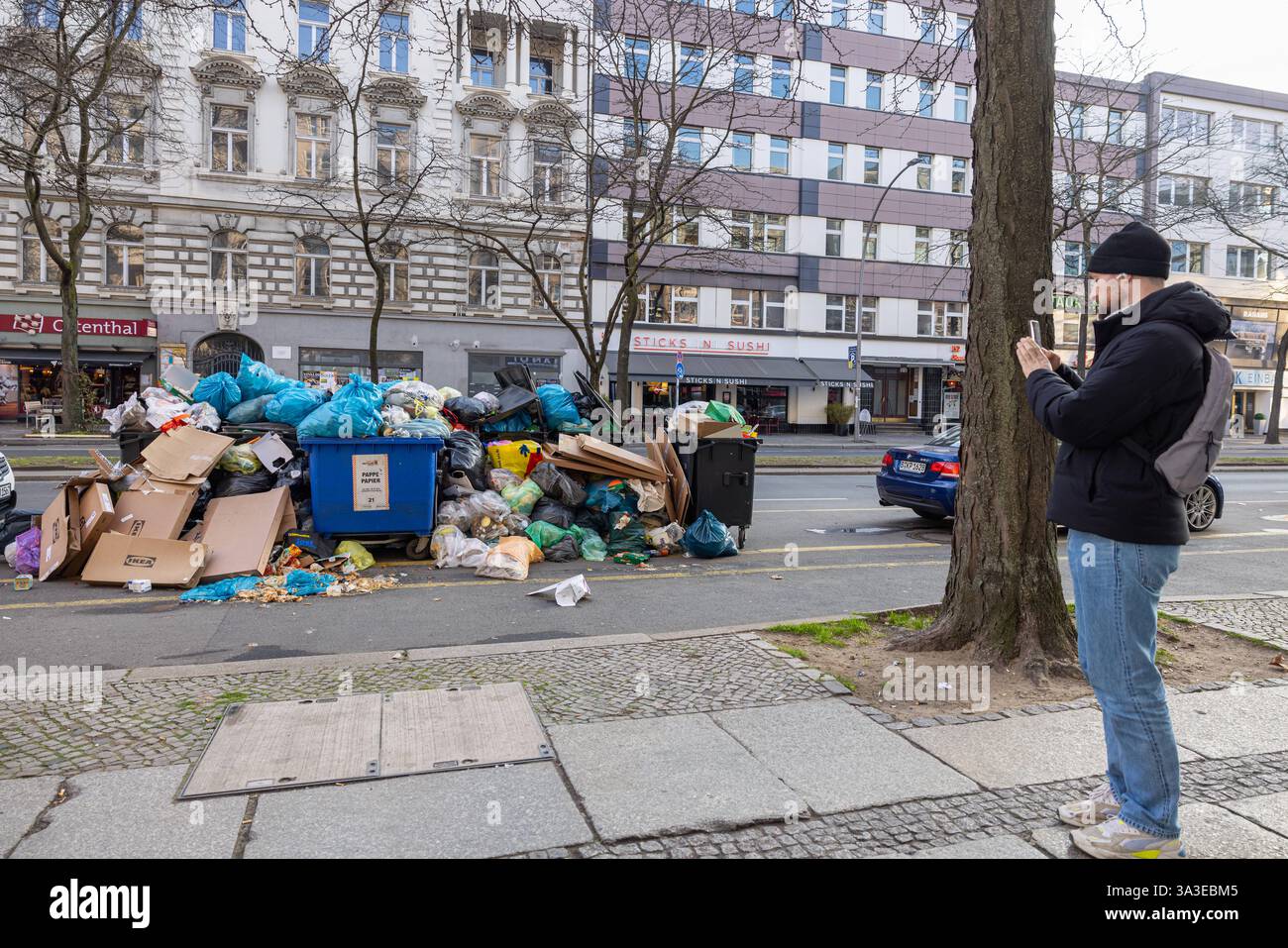Garbage containers lie in hi-res stock photography and images - Alamy