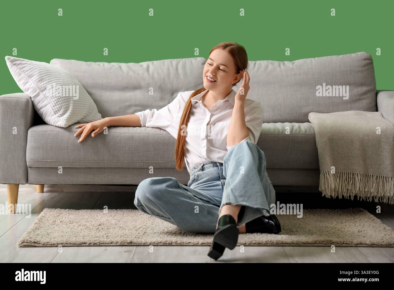 Young woman resting at home after long working day Stock Photo - Alamy