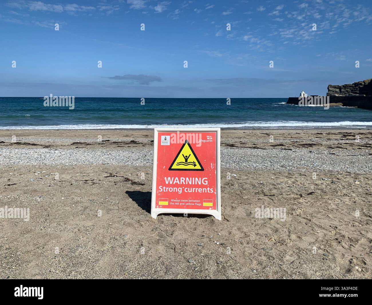 Strong Current warning sign on Portreath beach in Cornwall - Smartphone Captured Stock Image