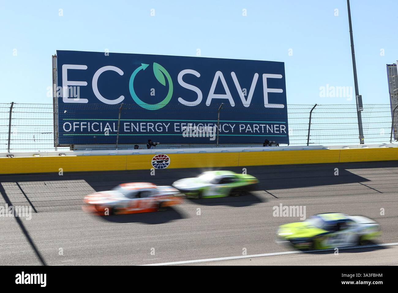 LAS VEGAS, NV - MARCH 15: Cars drive through turn one during the NASCAR ...