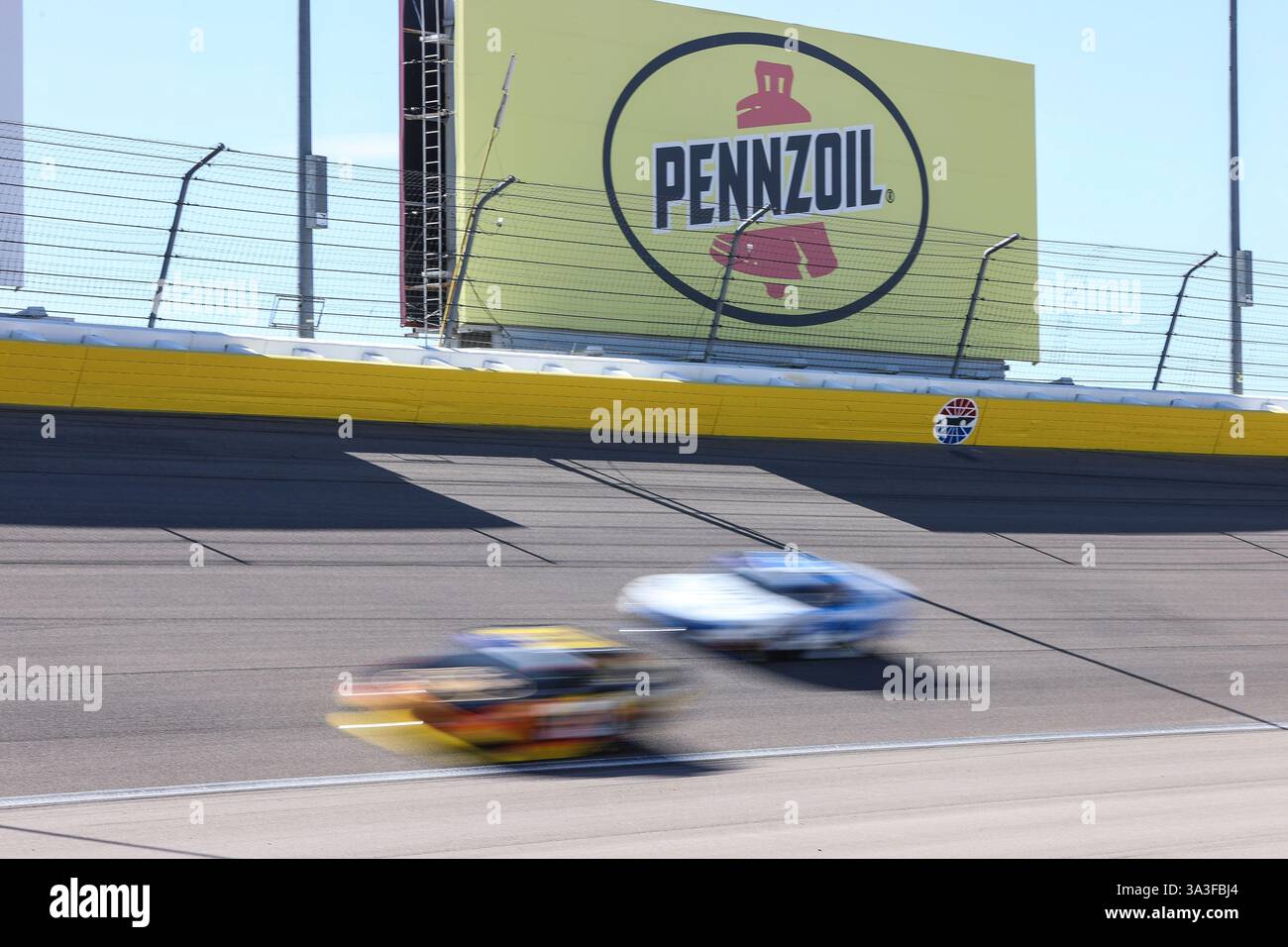 LAS VEGAS, NV - MARCH 15: Cars drive through turn one during the NASCAR ...