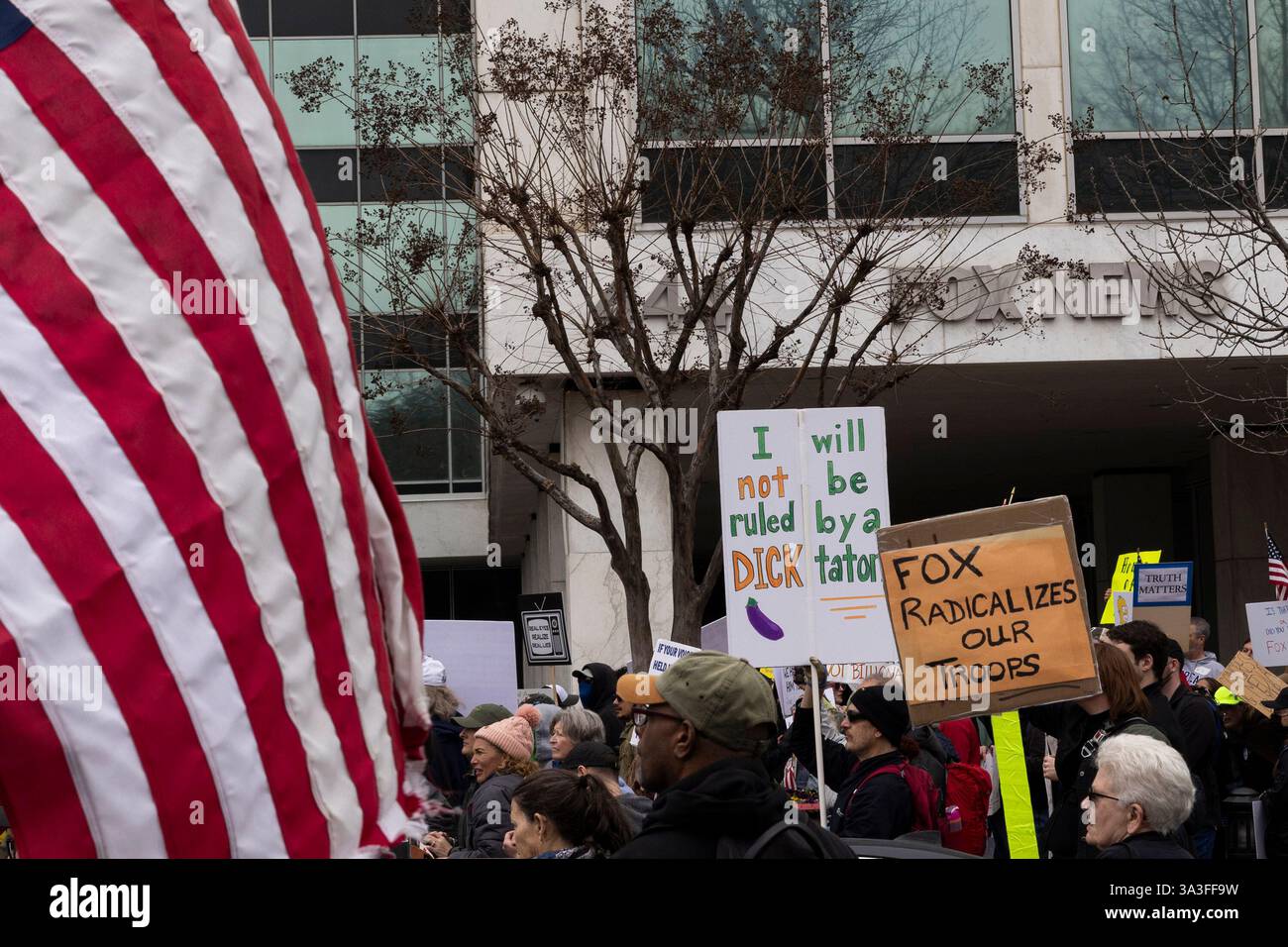 Hundreds of protesters gather and protest in front of the Fox News Washington, D.C., bureau on