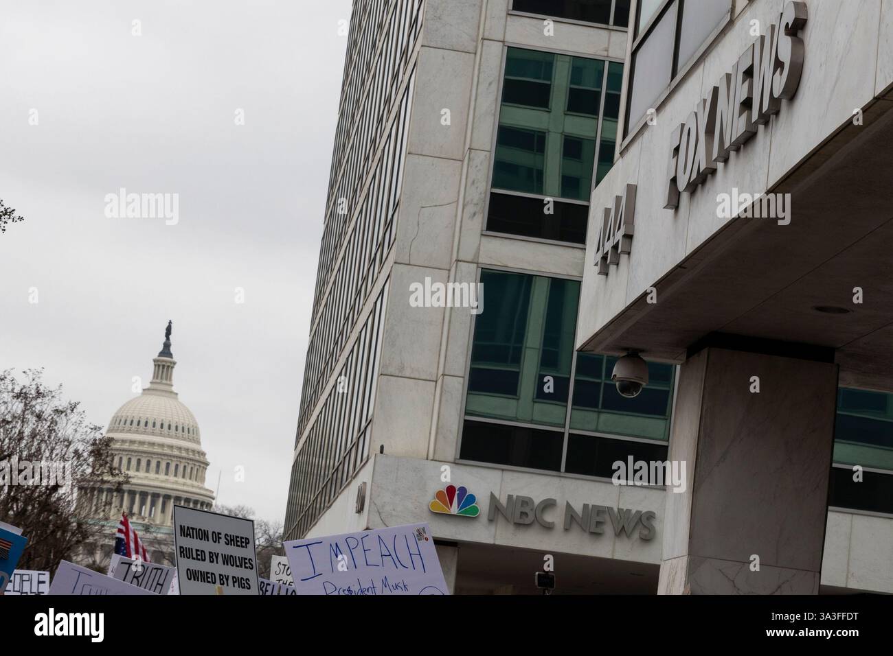 Hundreds of protesters gather and protest in front of the NBC News, and Fox News Washington, D.C