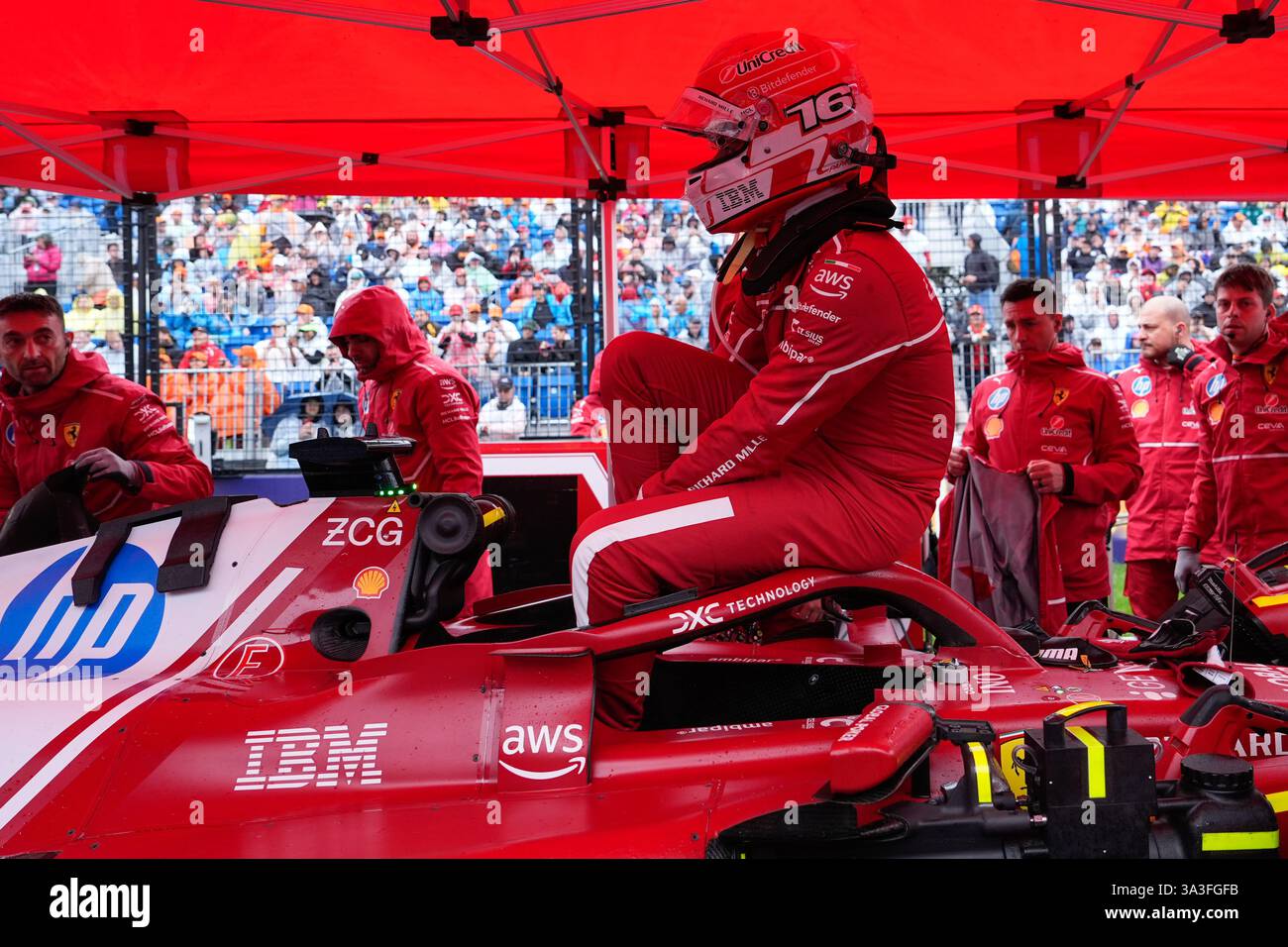 Ferrari driver Charles Leclerc of Monaco sits on his as he waits for the start of the Australian
