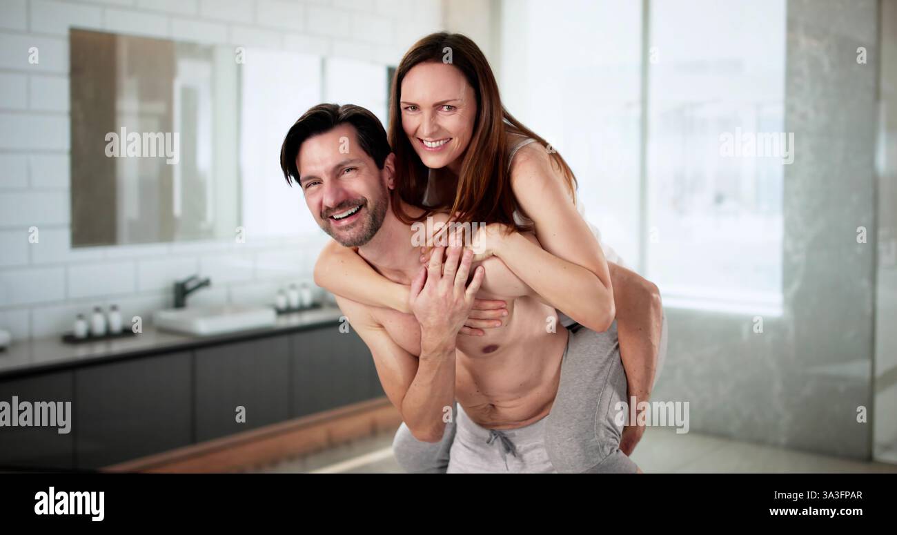 Bathroom Moment: A Couple Laughing and Having Fun Together Stock Photo