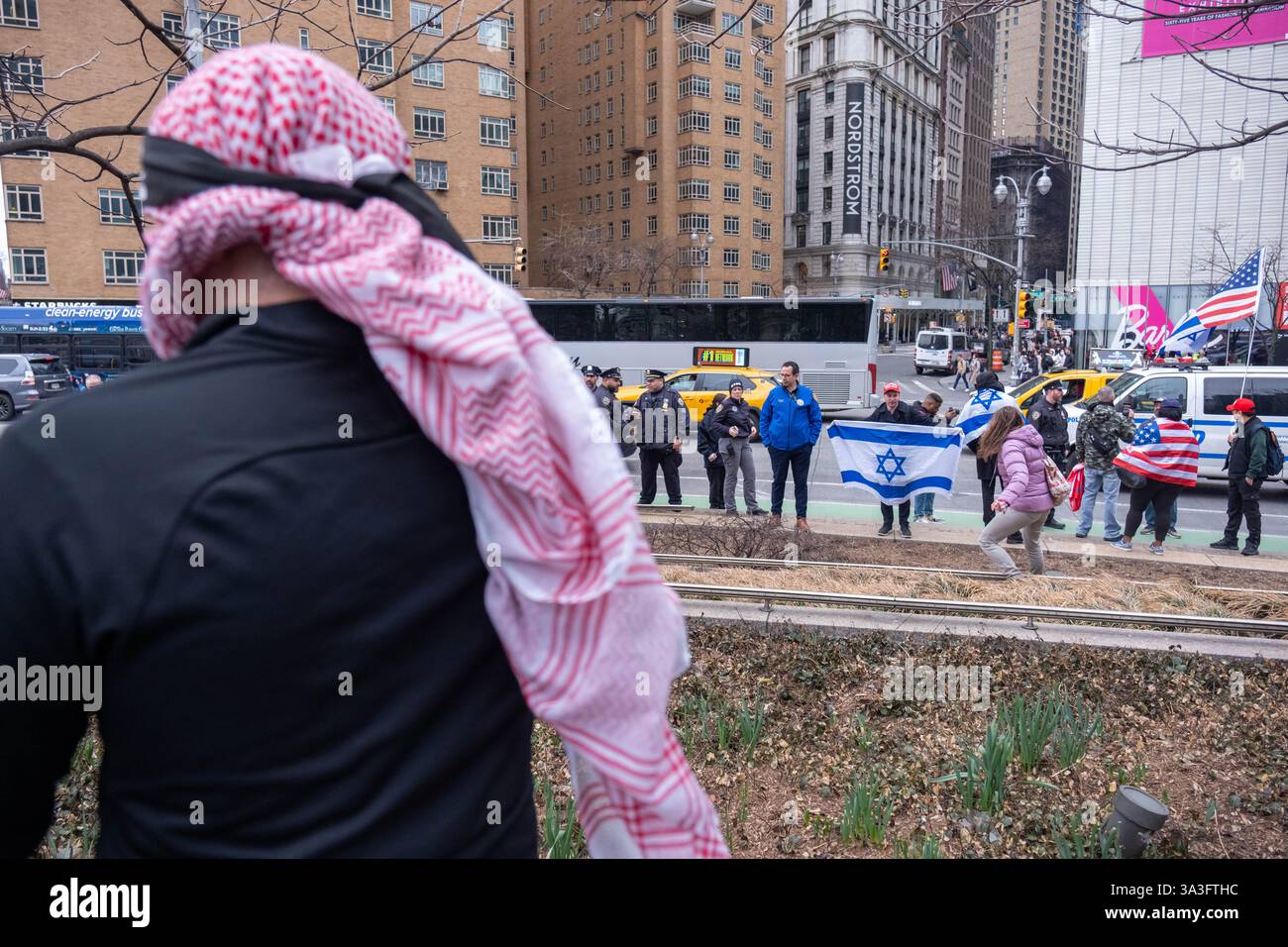 New York, USA. 15th Mar, 2025. A small group proIsrael supporters