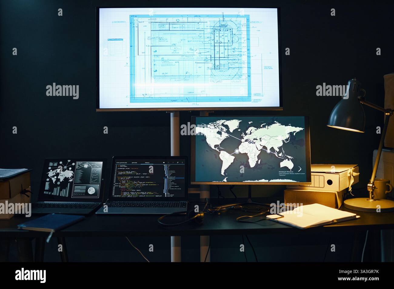 Analyzing Global Data on Multiple Digital Devices Stock Photo