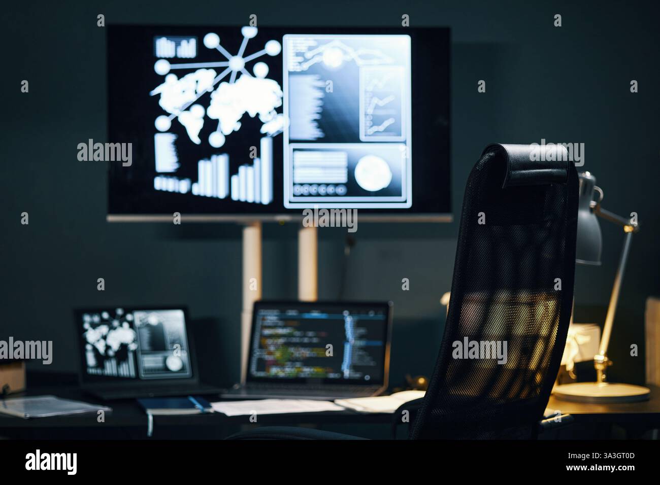Displaying Data Interactive Screens and Computer at Office Desk Stock Photo