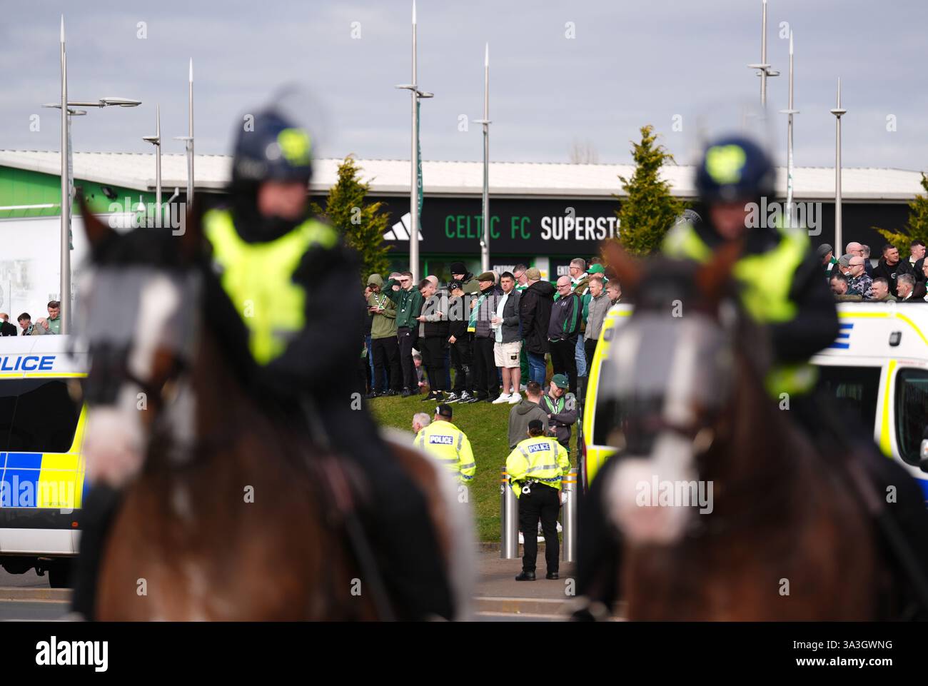 Celtic fans and police officers ahead of the William Hill Premiership ...