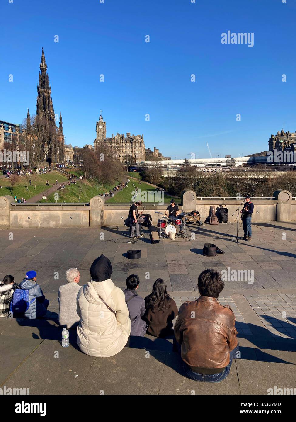 Busking live music at the The Mound, Edinburgh Scotland - Smartphone Captured Stock Image