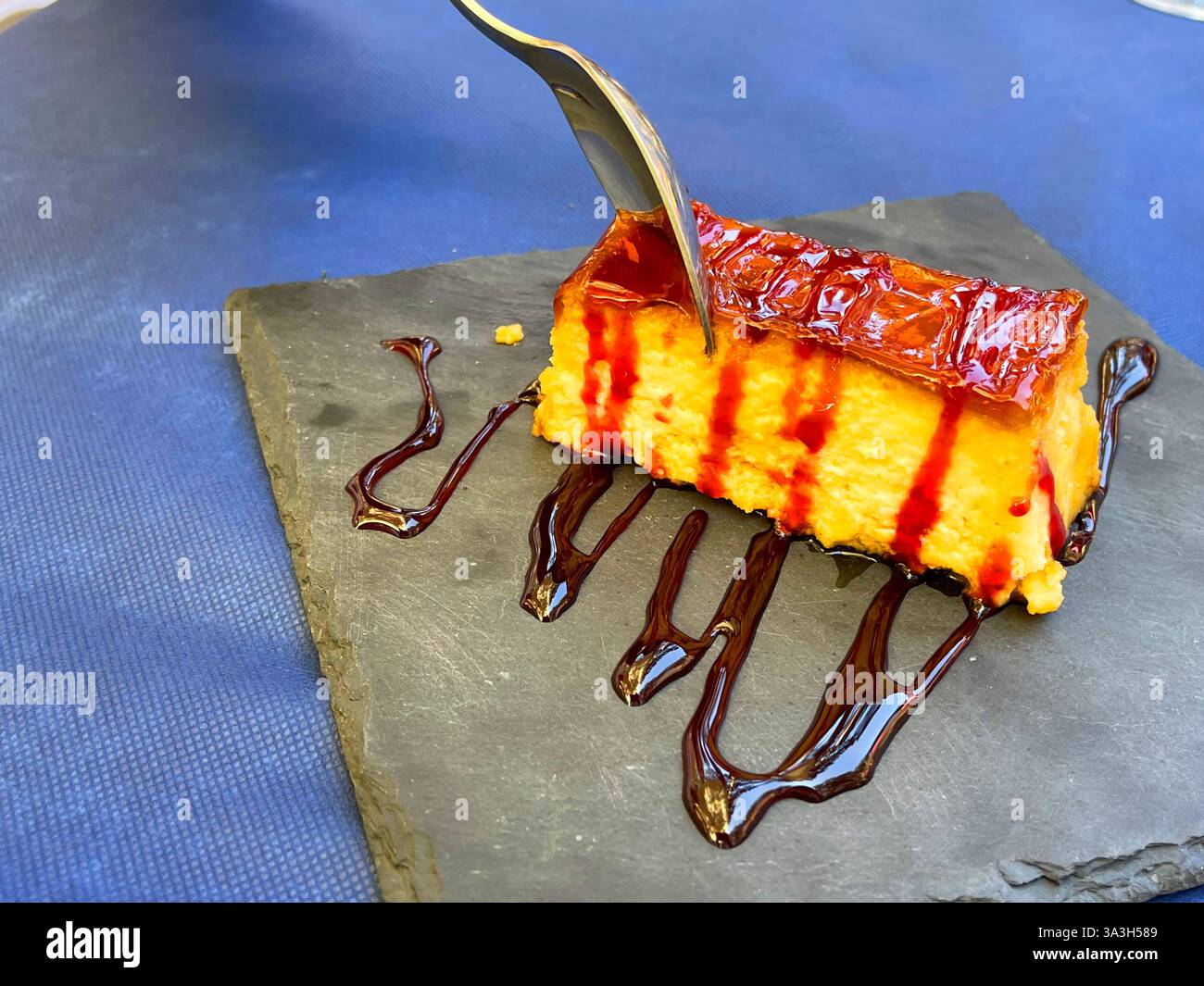 Eating cheese cake. Spain. - Smartphone Captured Stock Image