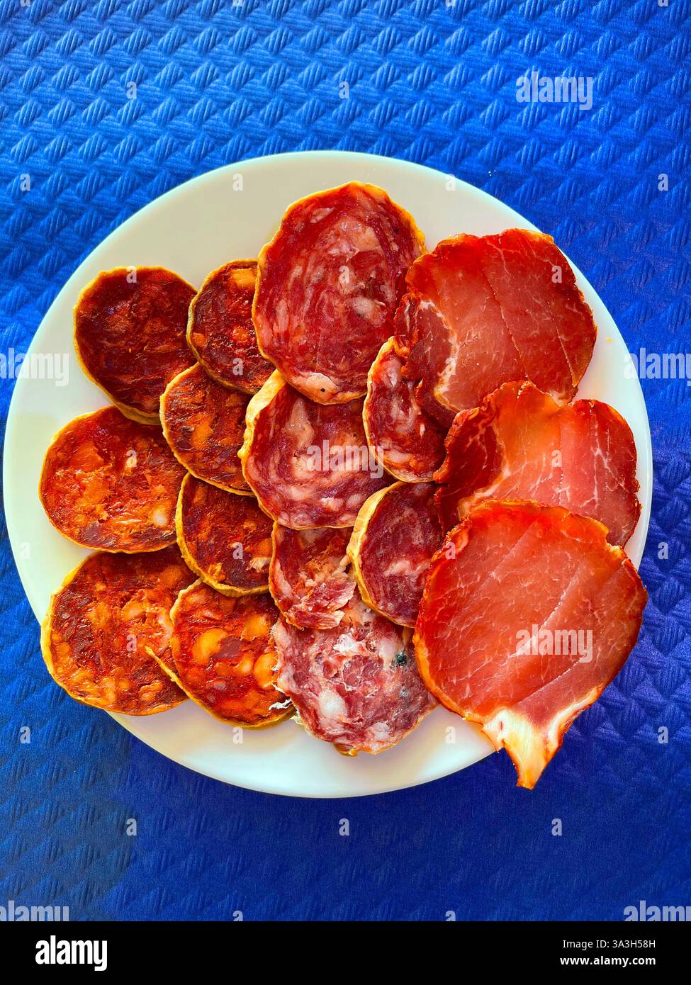 Iberian sausages: chorizo, salchichon and loin. Spain. - Smartphone Captured Stock Image