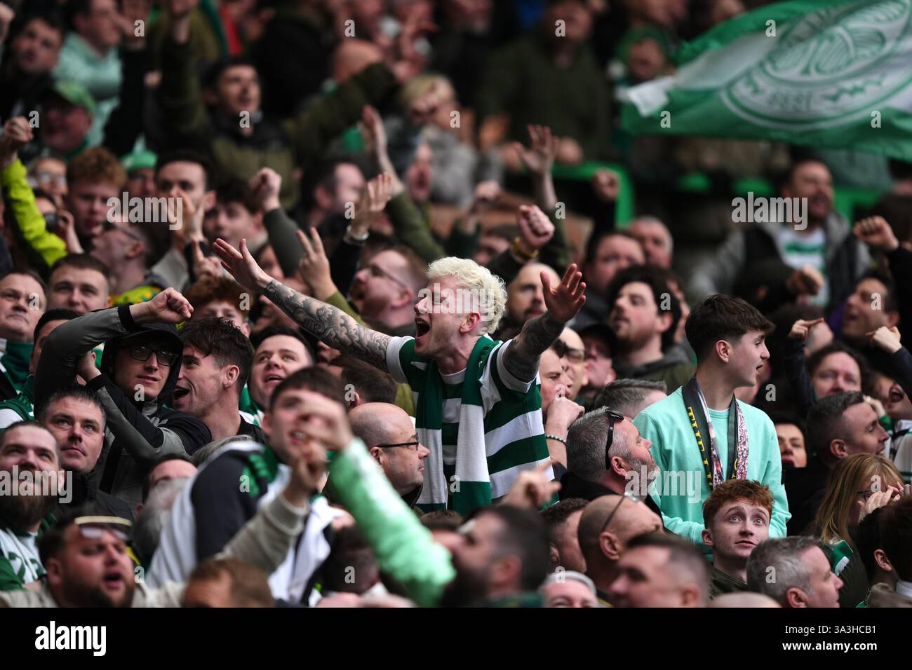 Celtic fans celebrate in the stands during the William Hill Premiership ...