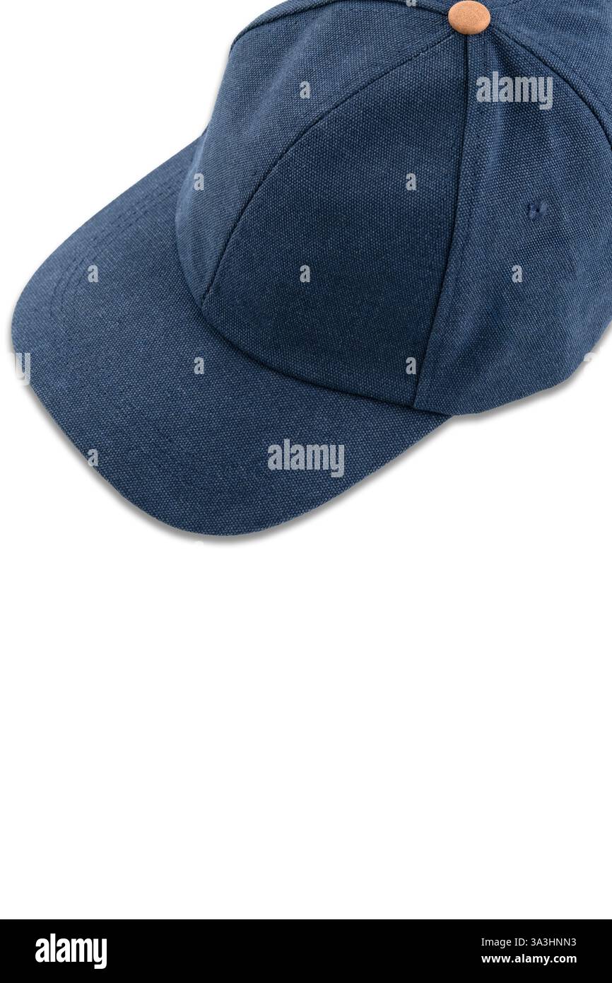 Blue textile baseball cap with brown button, top view, on white background Stock Photo