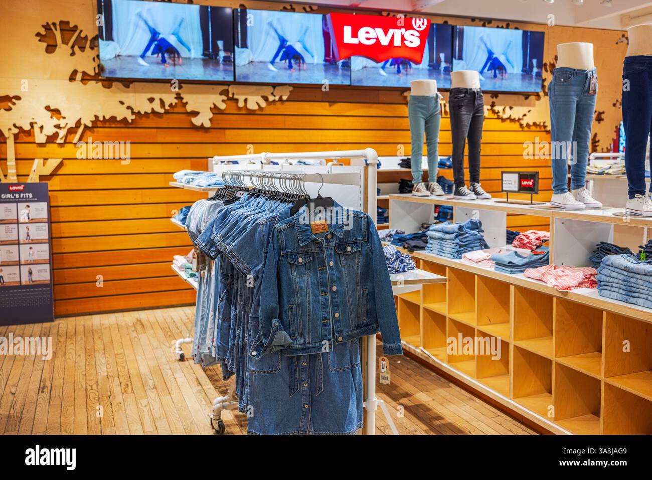 Levi's denim jackets and jeans on display inside Macy's department ...