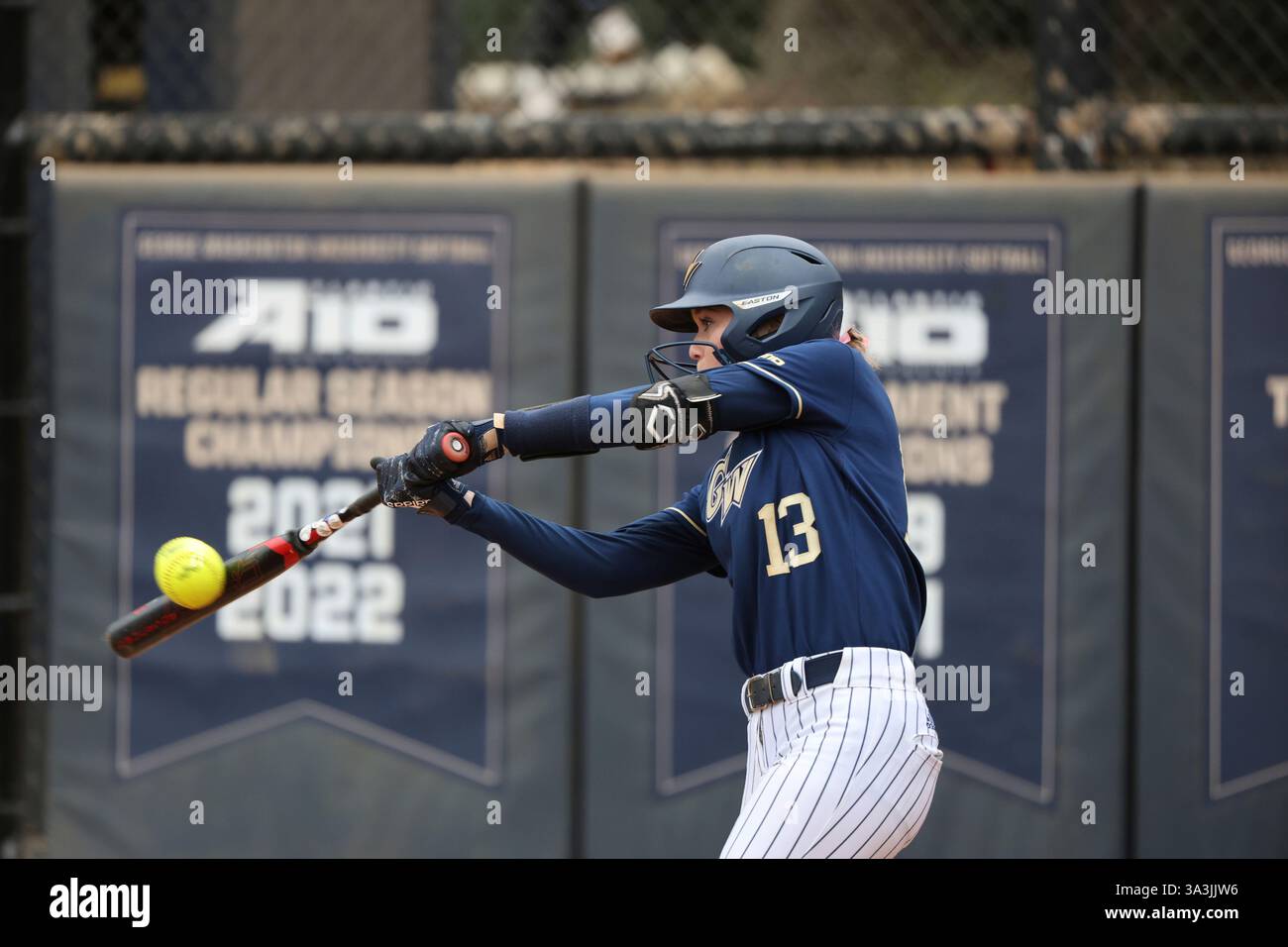 George Washington infielder Kaylee Layfield (13) takes a swing during ...