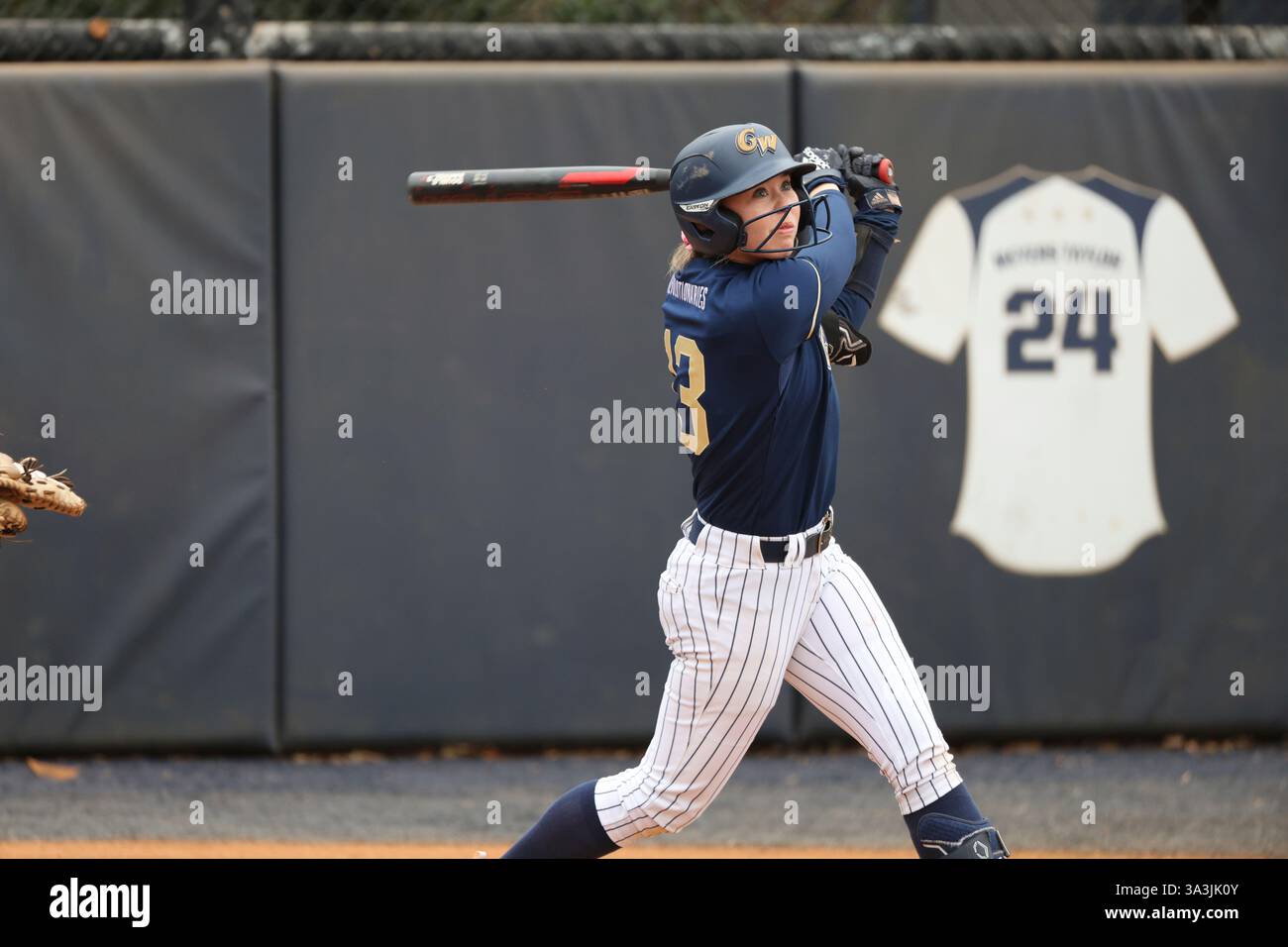 George Washington infielder Kaylee Layfield (13) takes a swing during ...