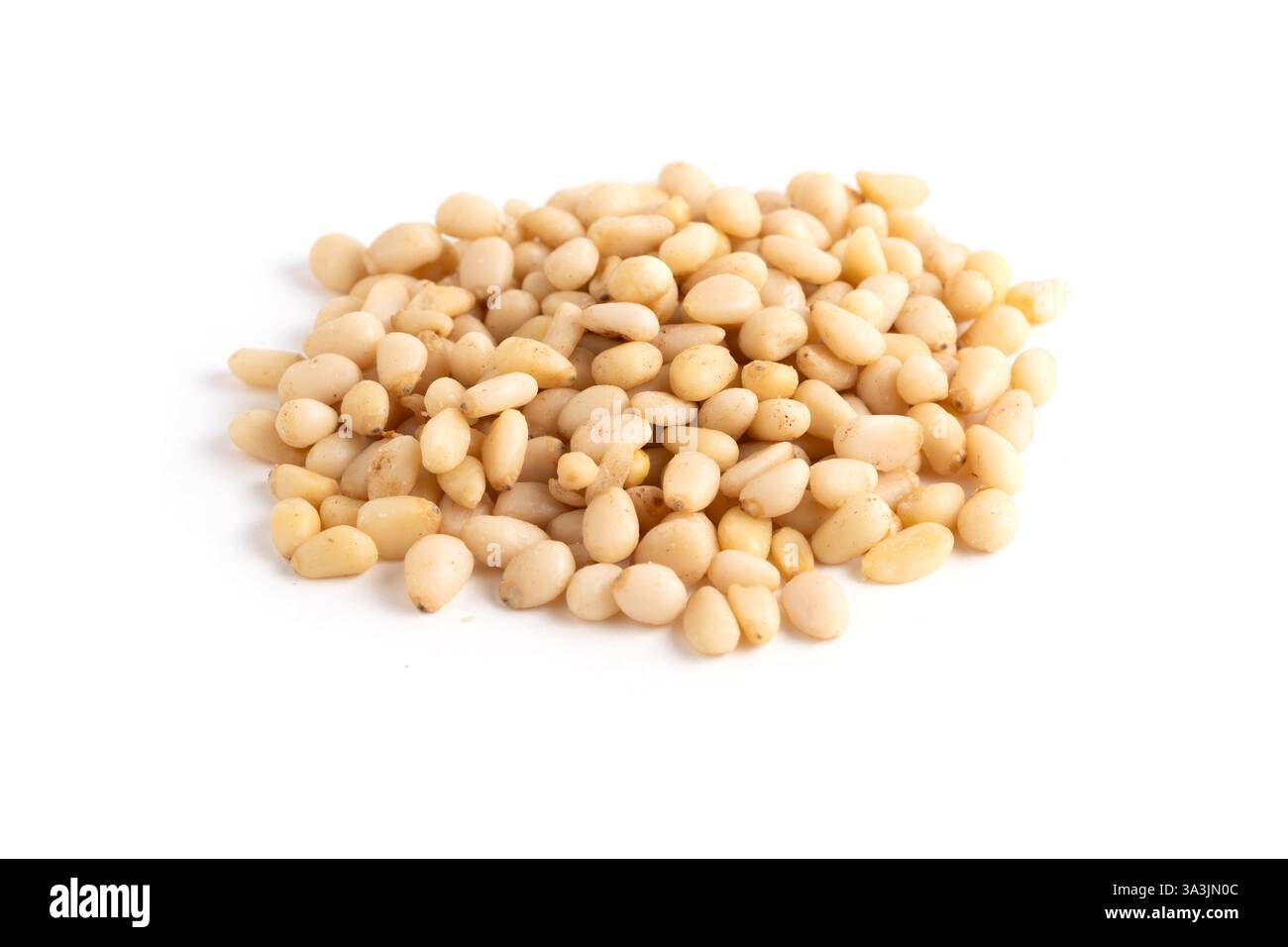 Pine nuts isolated on white background. Clipping path included Stock Photo