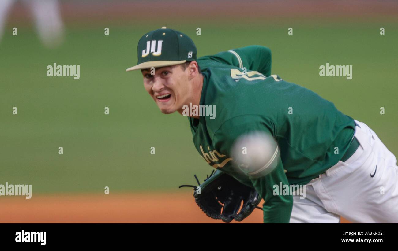 Jacksonville pitcher Alex Walsh (18) in action during an NCAA baseball ...