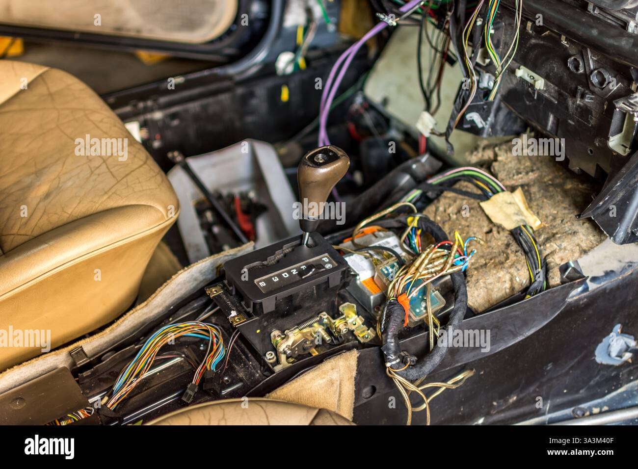 Disassembled car interior console for repair at car garage Stock Photo ...