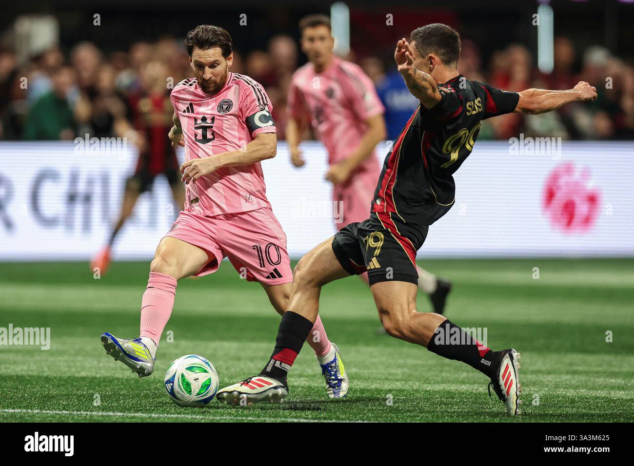 Inter Miami forward Lionel Messi (10) fights for the ball against ...