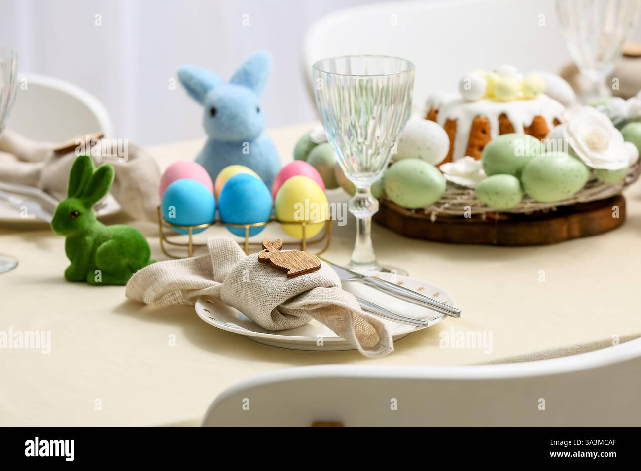 Table setting with Easter eggs, closeup Stock Photo