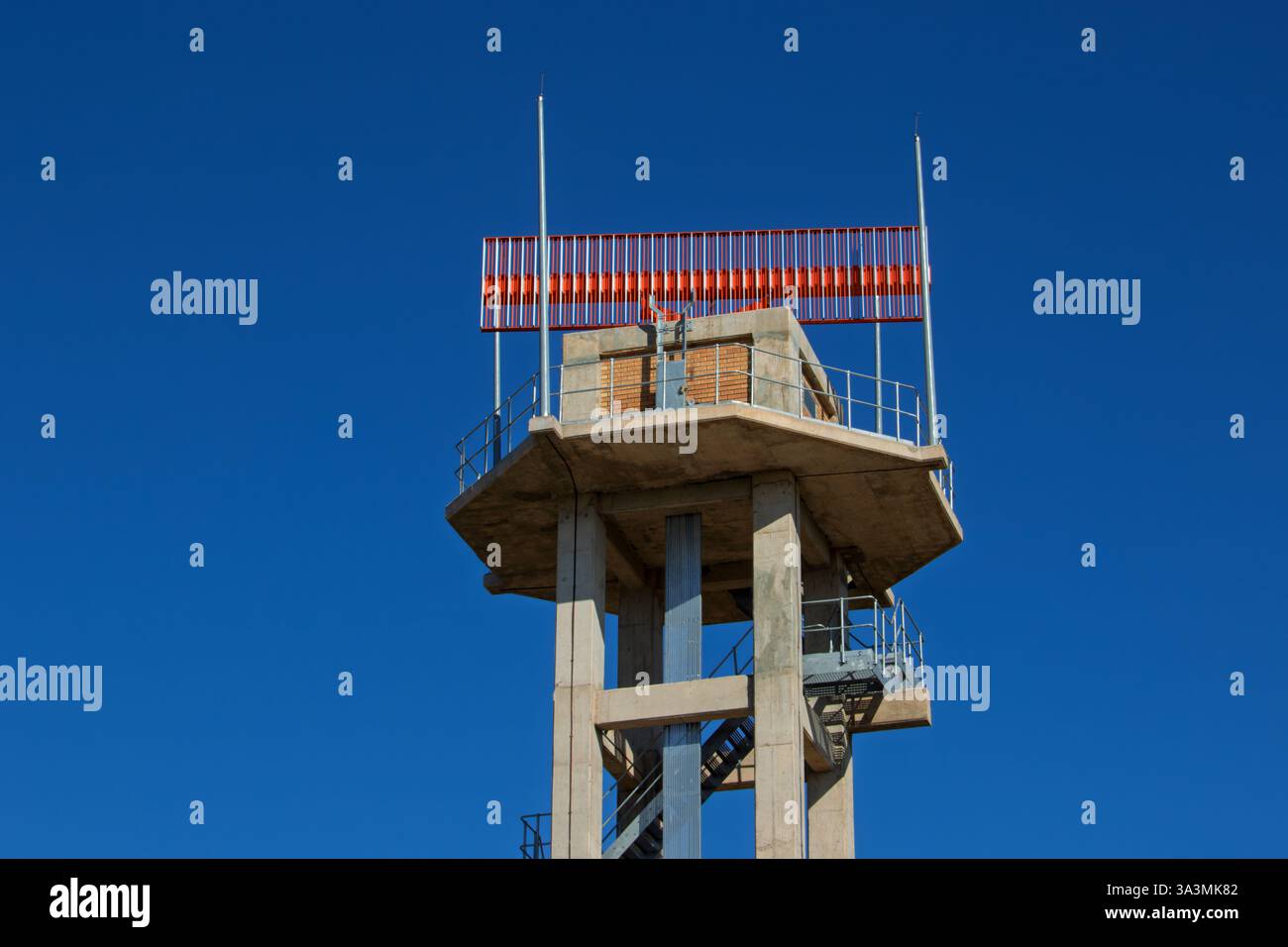 Aviation military radar in top of tower against the blue sky Stock ...