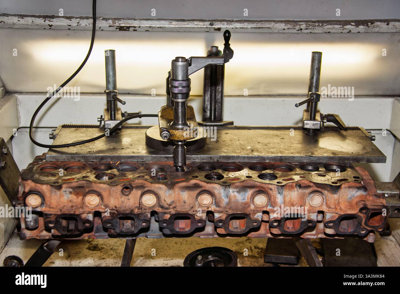 industrial machine reboring tooling a cylinder head Stock Photo - Alamy
