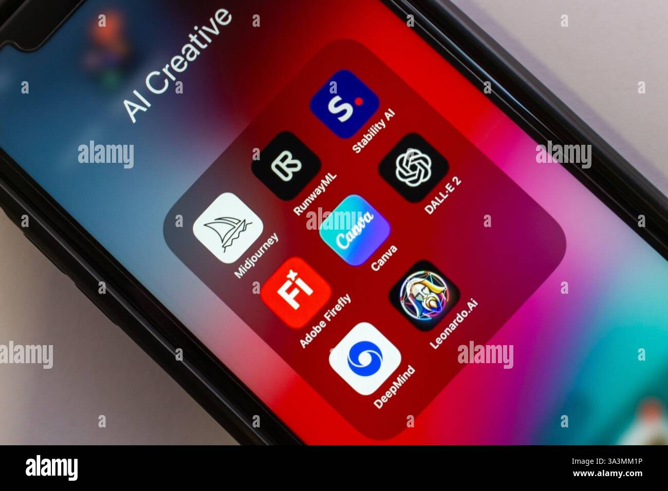 Mexico City, MEXICO - Mar 11 2025 : Midjourney, RunwayML, Stability AI, DALL·E 2, Canva, Adobe Firefly, Leonardo.Ai, and DeepMind icons on an iPhone. Stock Photo
