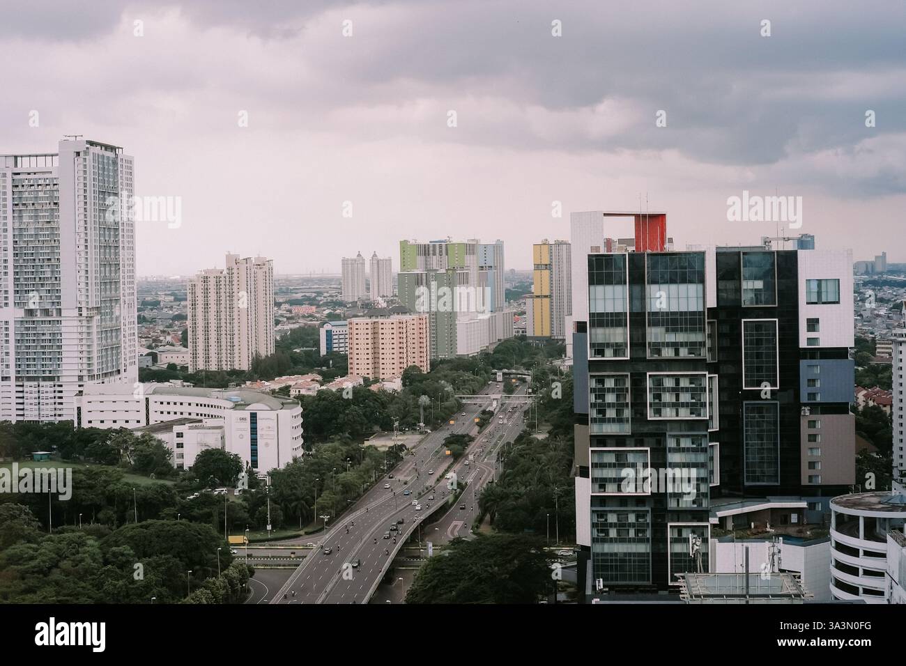 An aerial view captures the modern urban landscape of a city on a ...