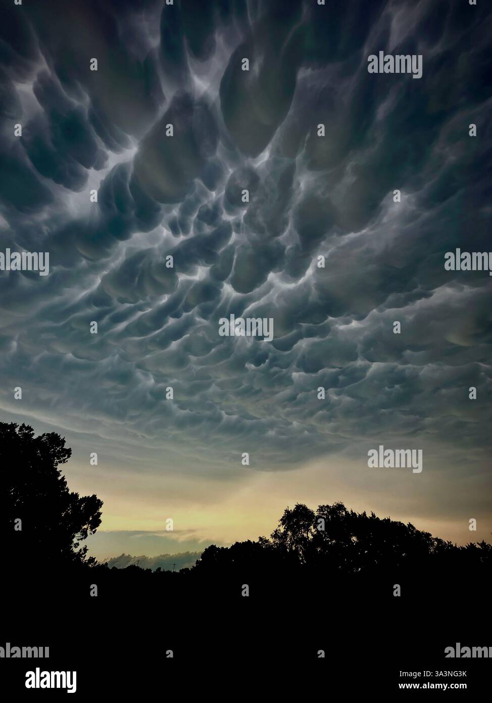 Mammatus Clouds precede an approaching storm. Stock Photo