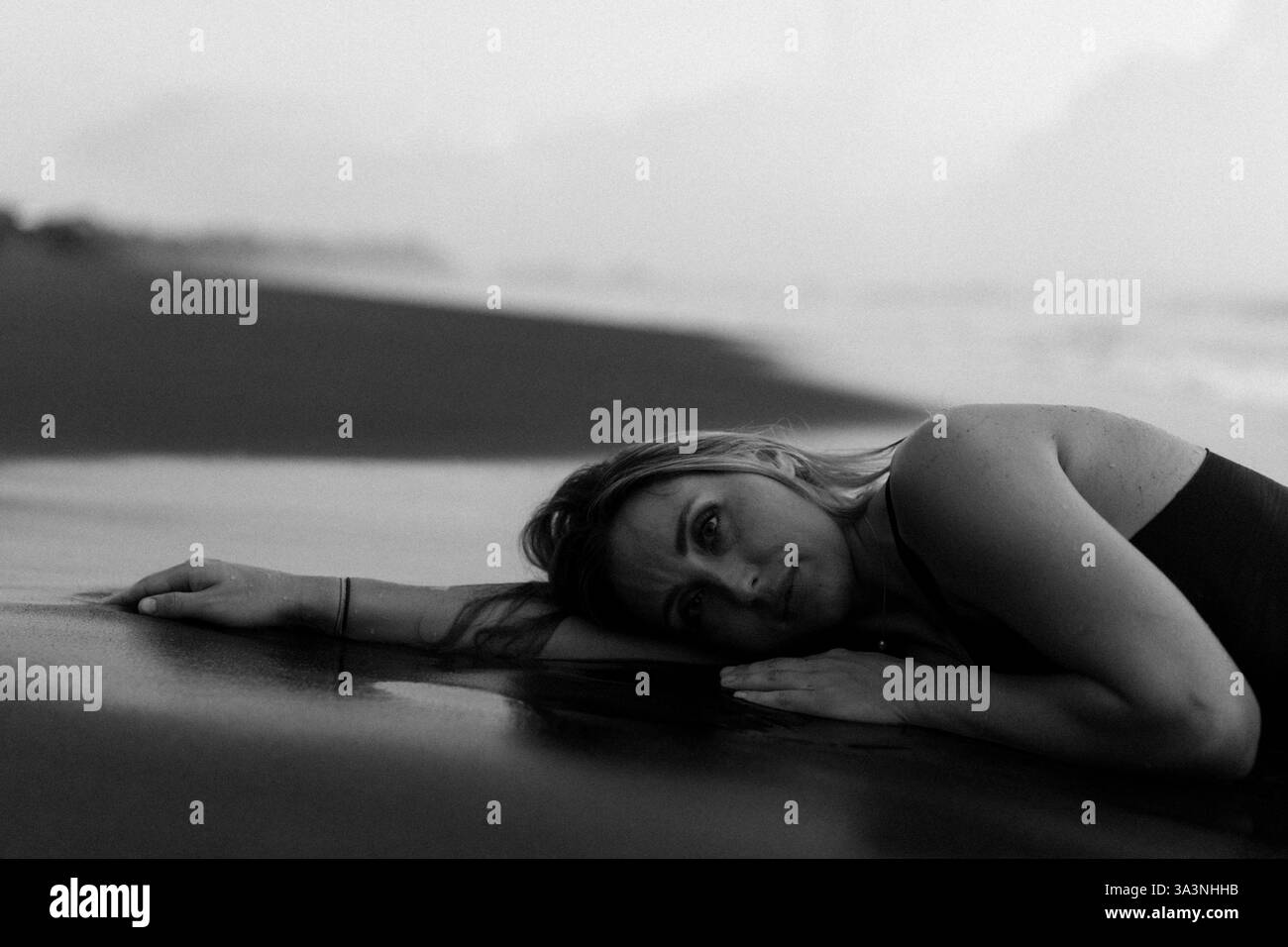 Sunset on remote beach Black and White Stock Photos & Images - Alamy