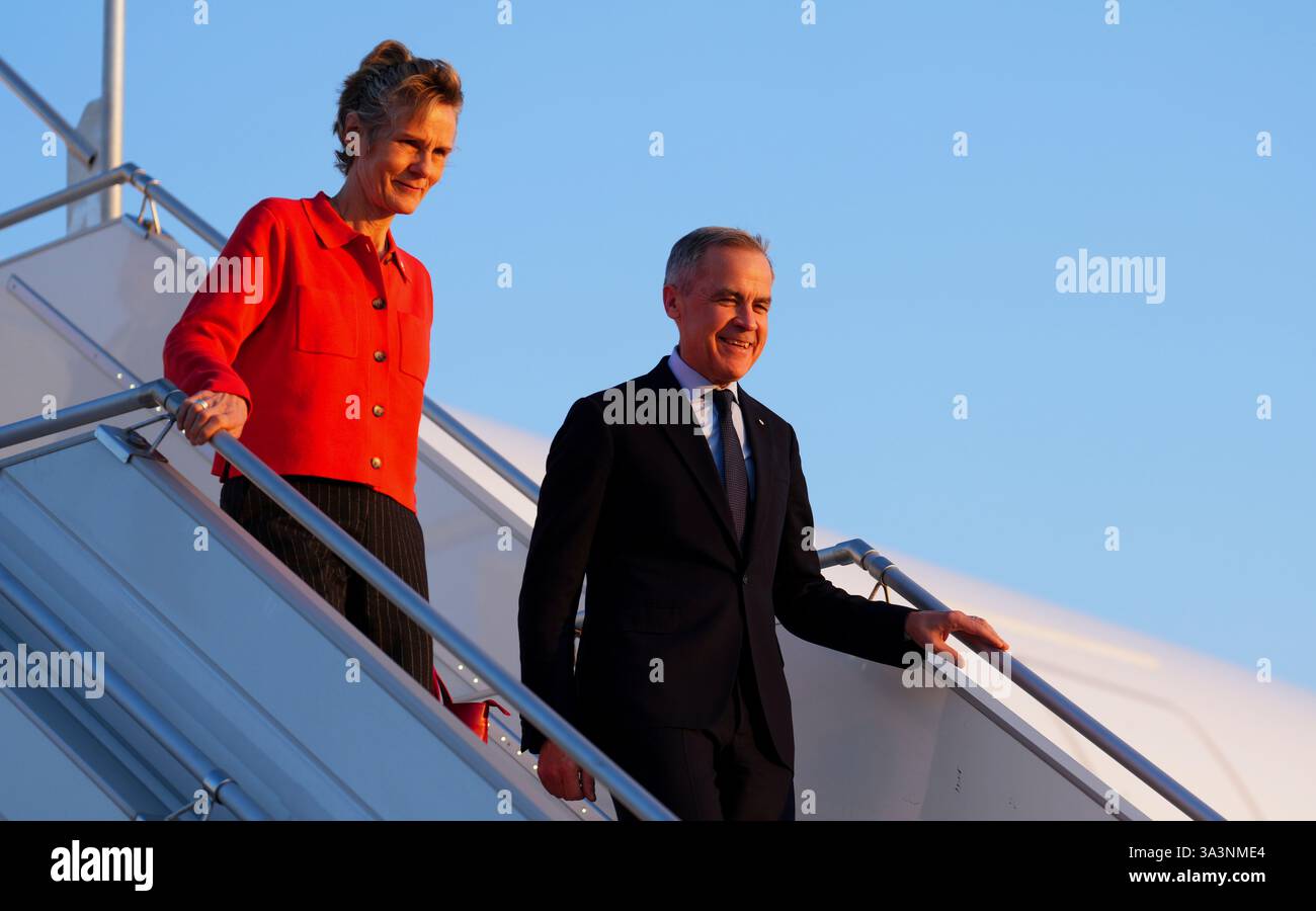 Canada's Prime Minister Mark Carney and wife Diana Fox Carney arrive in