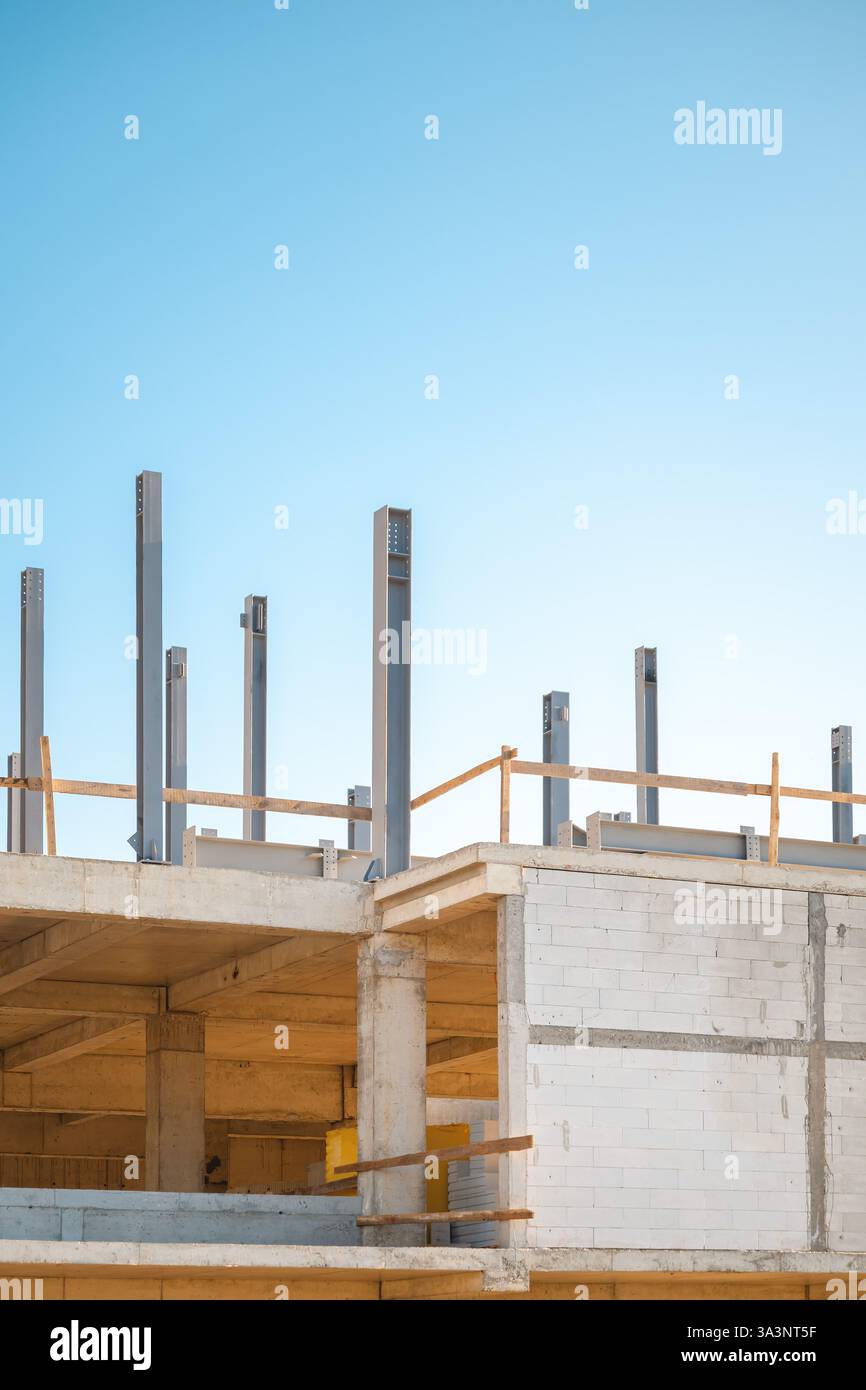 Post In Steel Structure Steel posts and beams at building construction site, selective focus ...