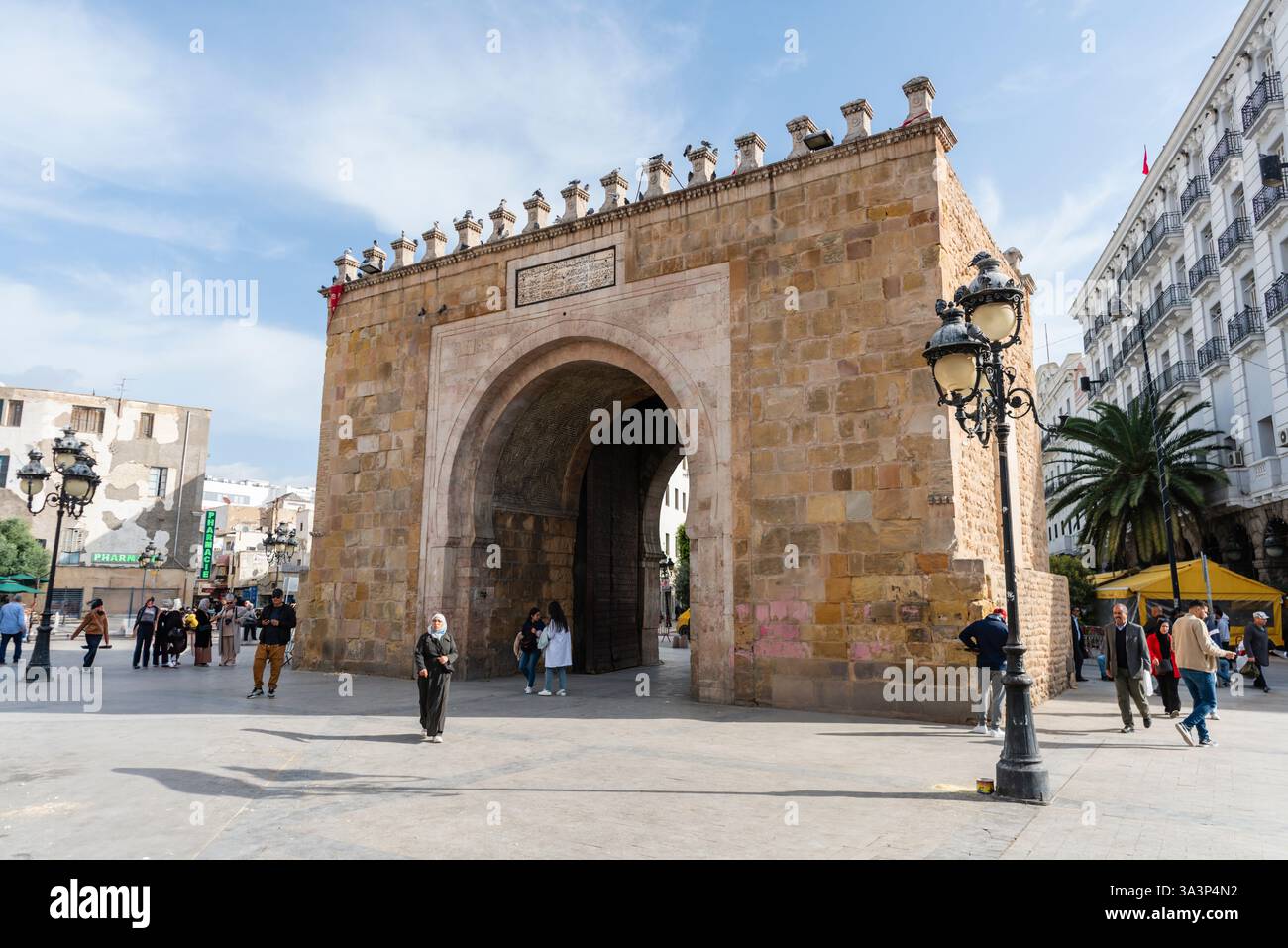 Bab al-Bhar arch (aka Porte de France), an 19th century gate leading to the Medina at Victory Square, Tunis, Tunisia Stock Photo