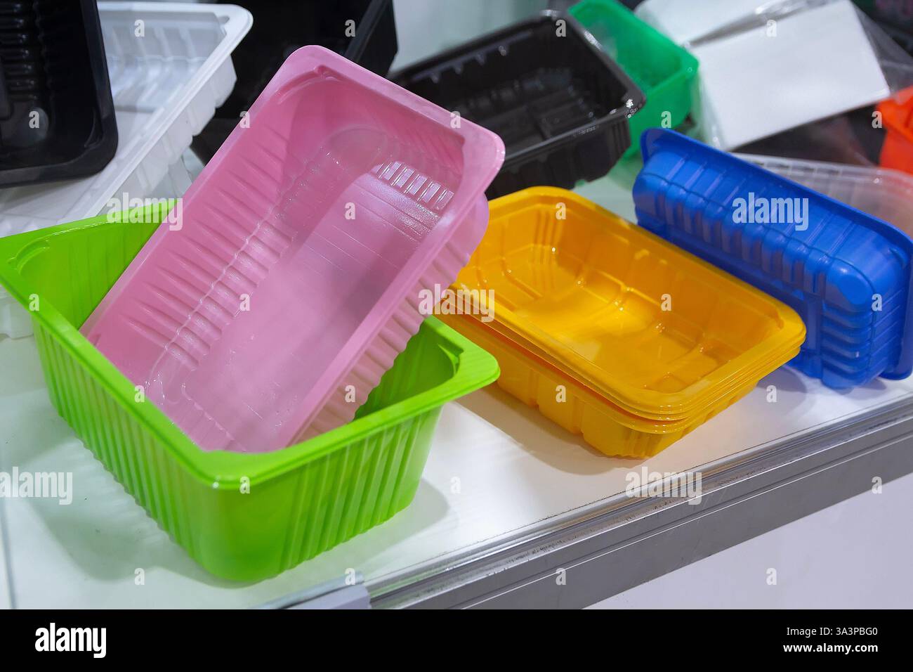 Samples of empty plastic boxes for lunch on the showcase. Industry Stock Photo