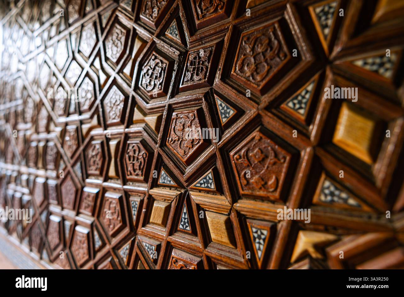 Islamic Wood Roster Islamic pattern on the wooden door of a mosque in focus. Ramadan or ...