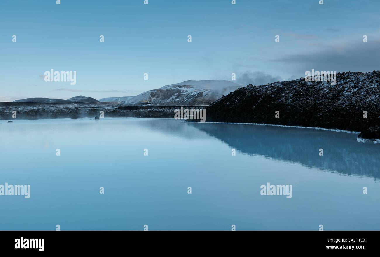 Geothermal byproduct water ponds near the surrounding area and entrance of the Blue Lagoon bathing resort Iceland. Stock Photo