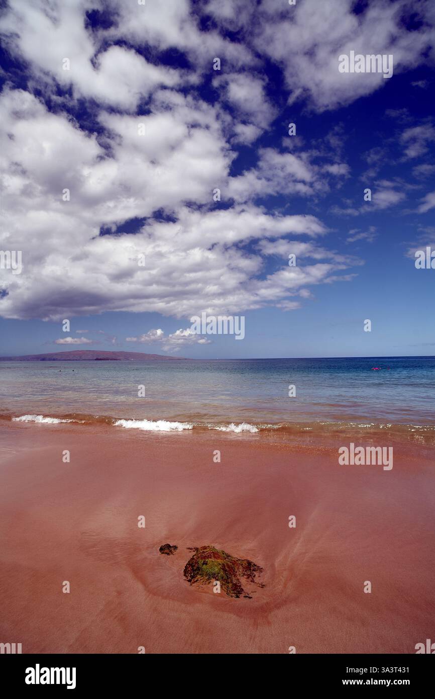 Sandy beach with blue sky and white clouds Stock Photo - Alamy